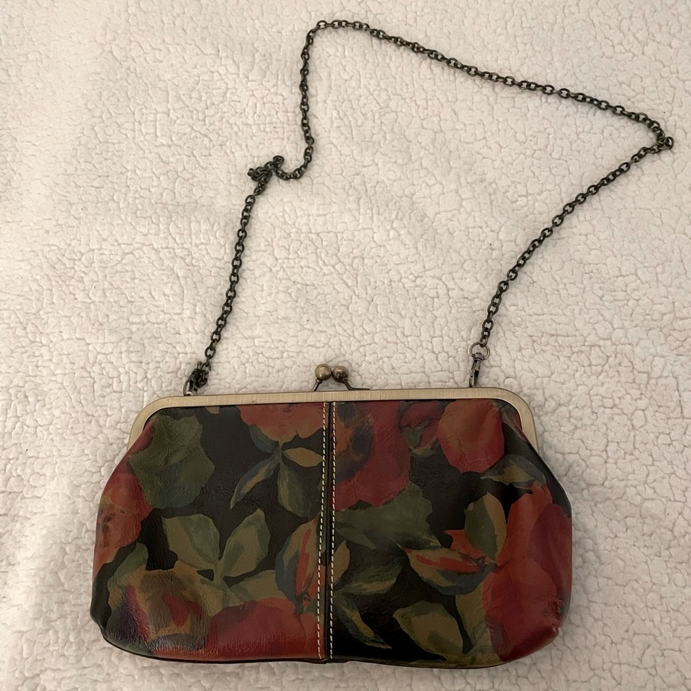 Rose patterned Clutch with removable Chain. Never carried.